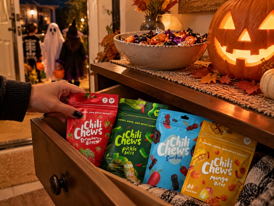 Hiding Chili Chews pouches in a drawer while the trick-or-treat bowl waits by the door